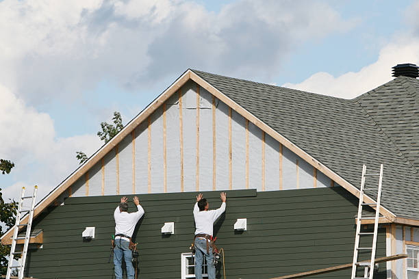 Professional Siding technician working in Waltham, MA